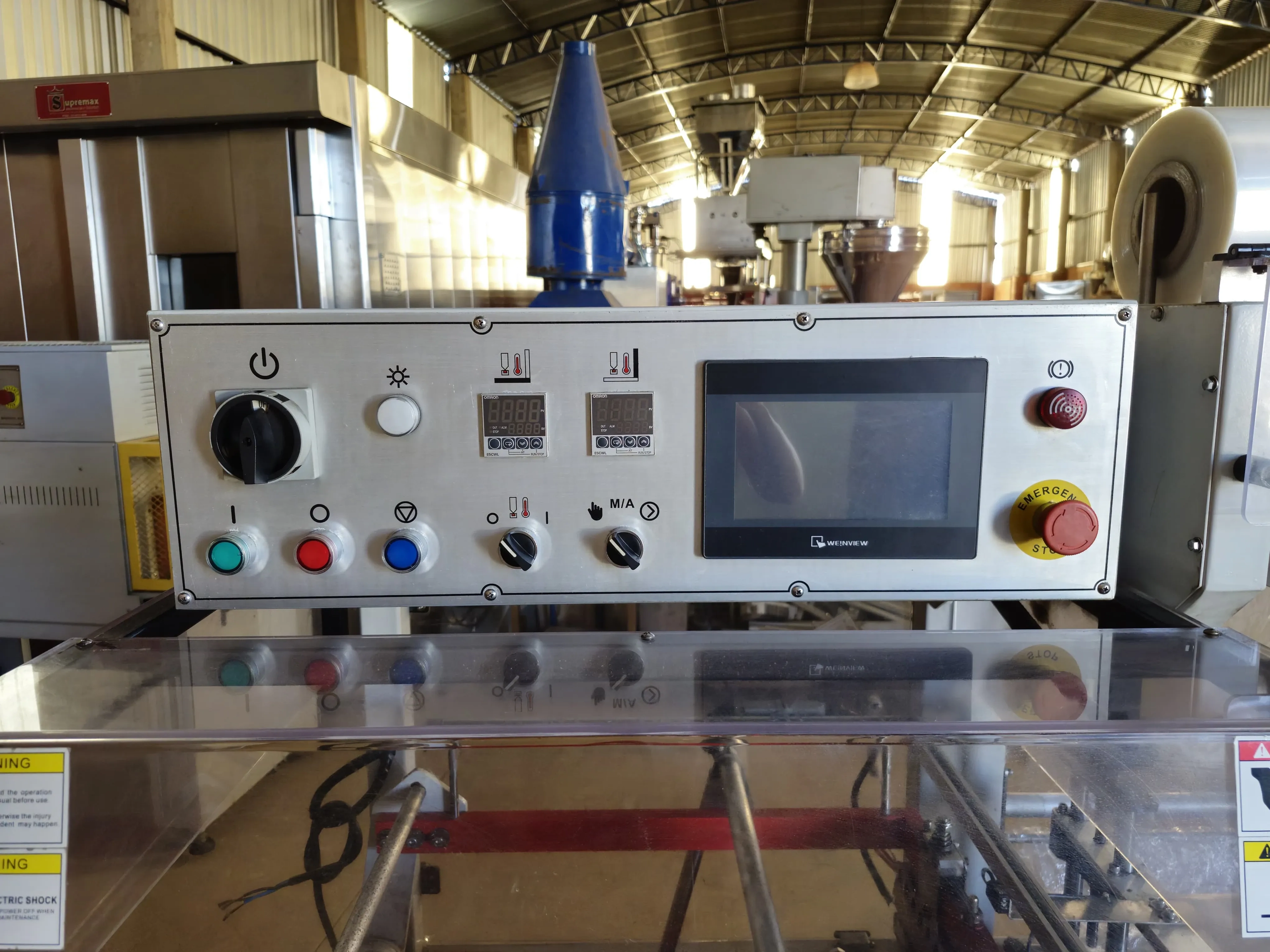 seladora-automatica-em-l-shrink-marca-tecfag