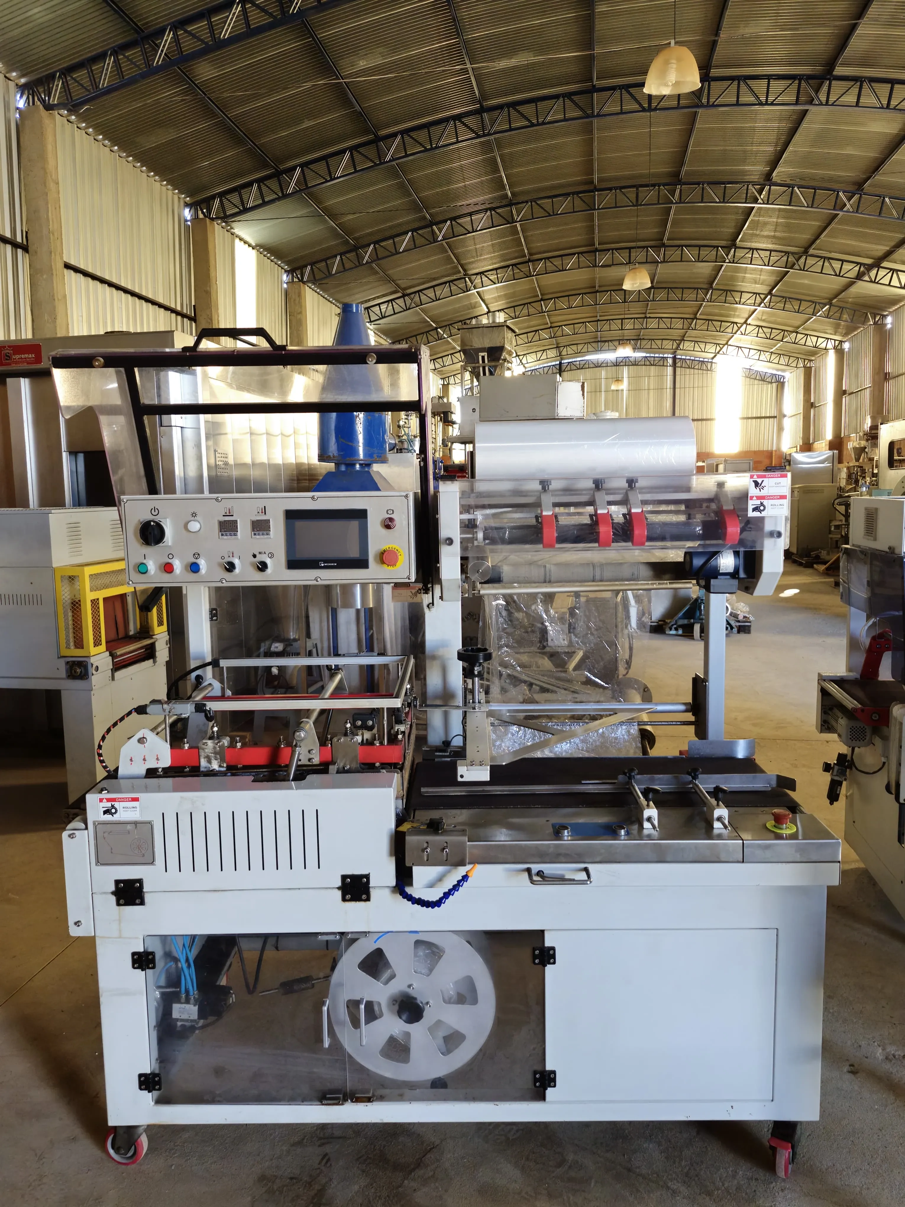 seladora-automatica-em-l-shrink-marca-tecfag