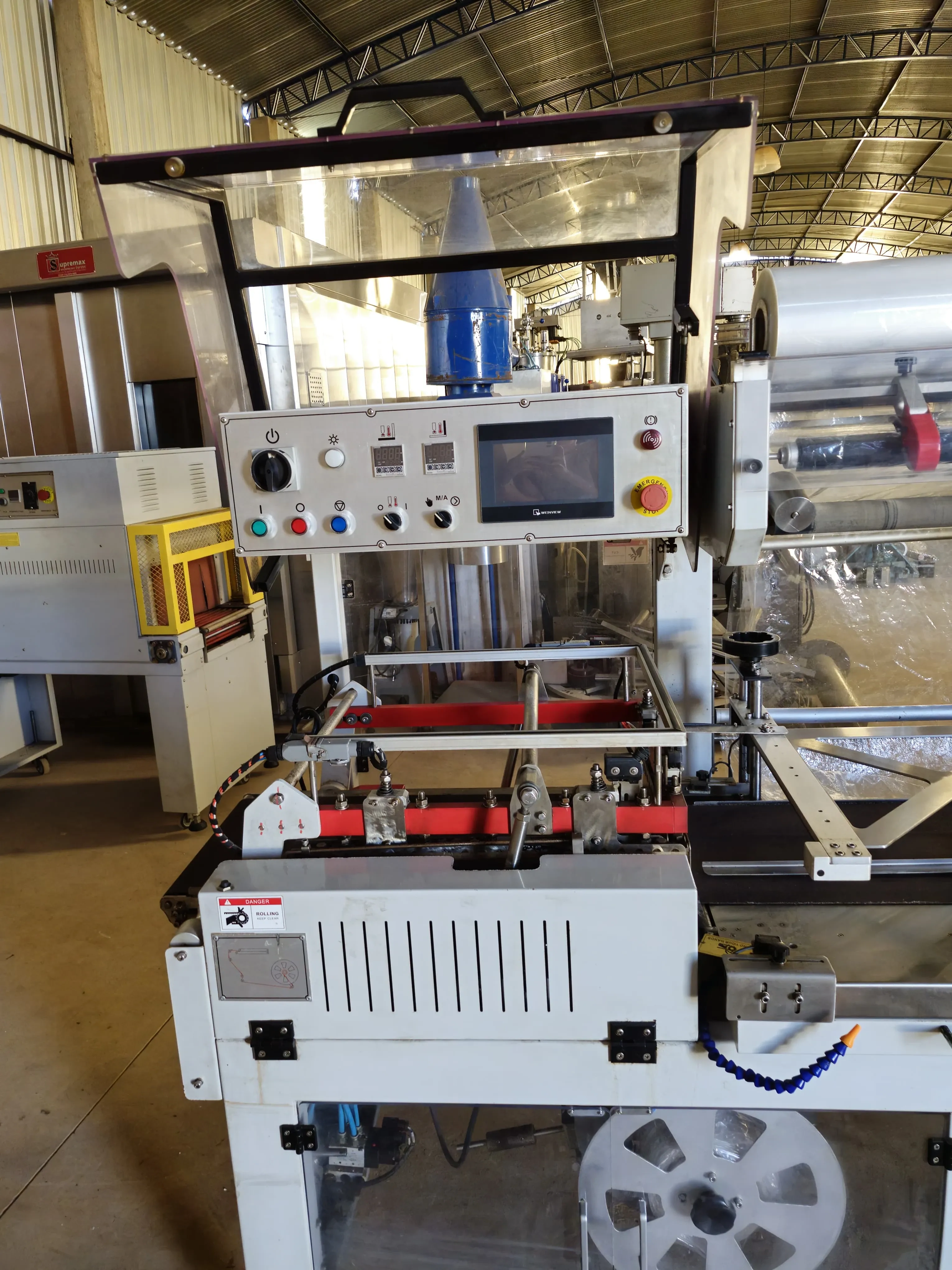 seladora-automatica-em-l-shrink-marca-tecfag