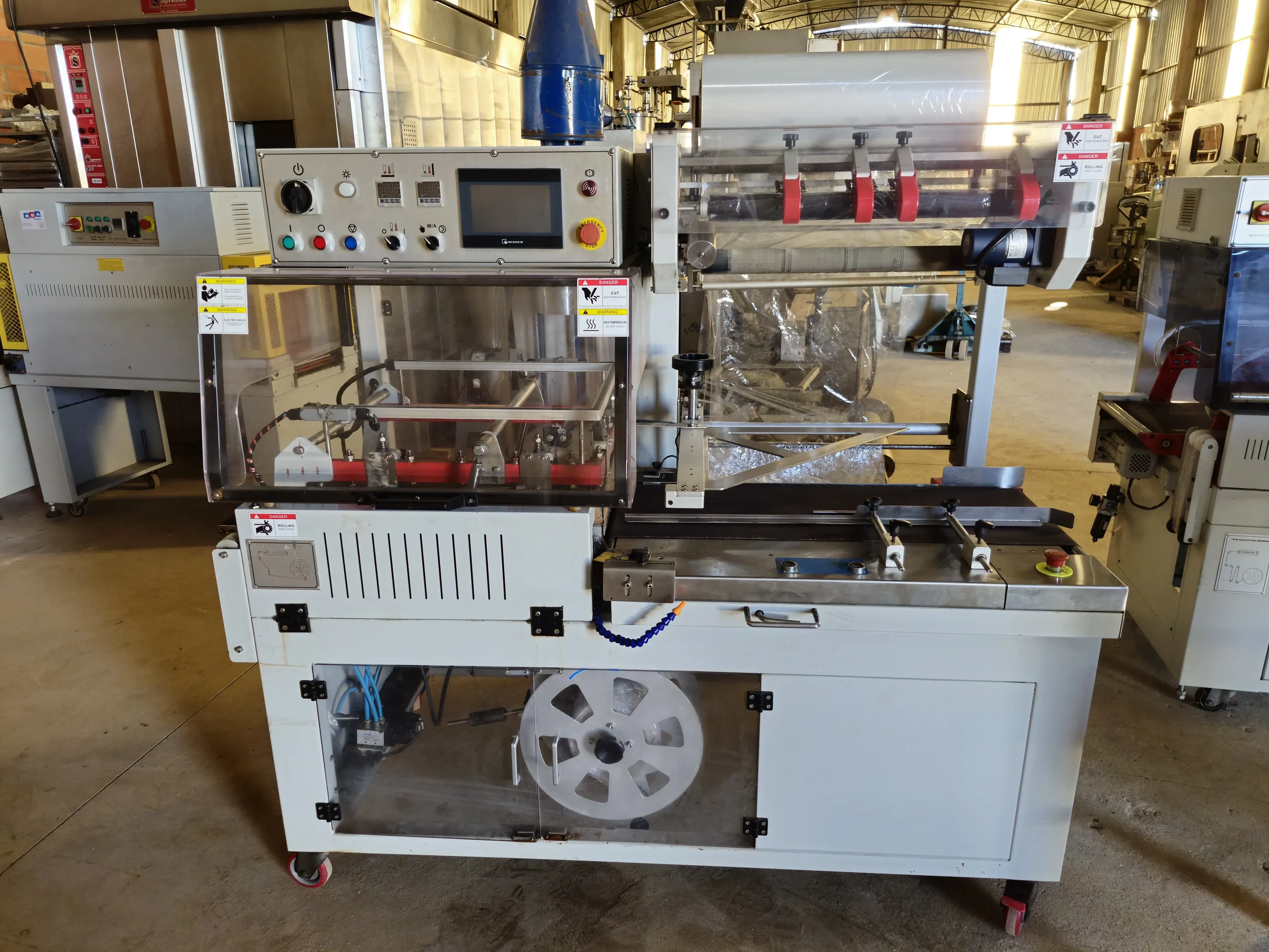 seladora-automatica-em-l-shrink-marca-tecfag