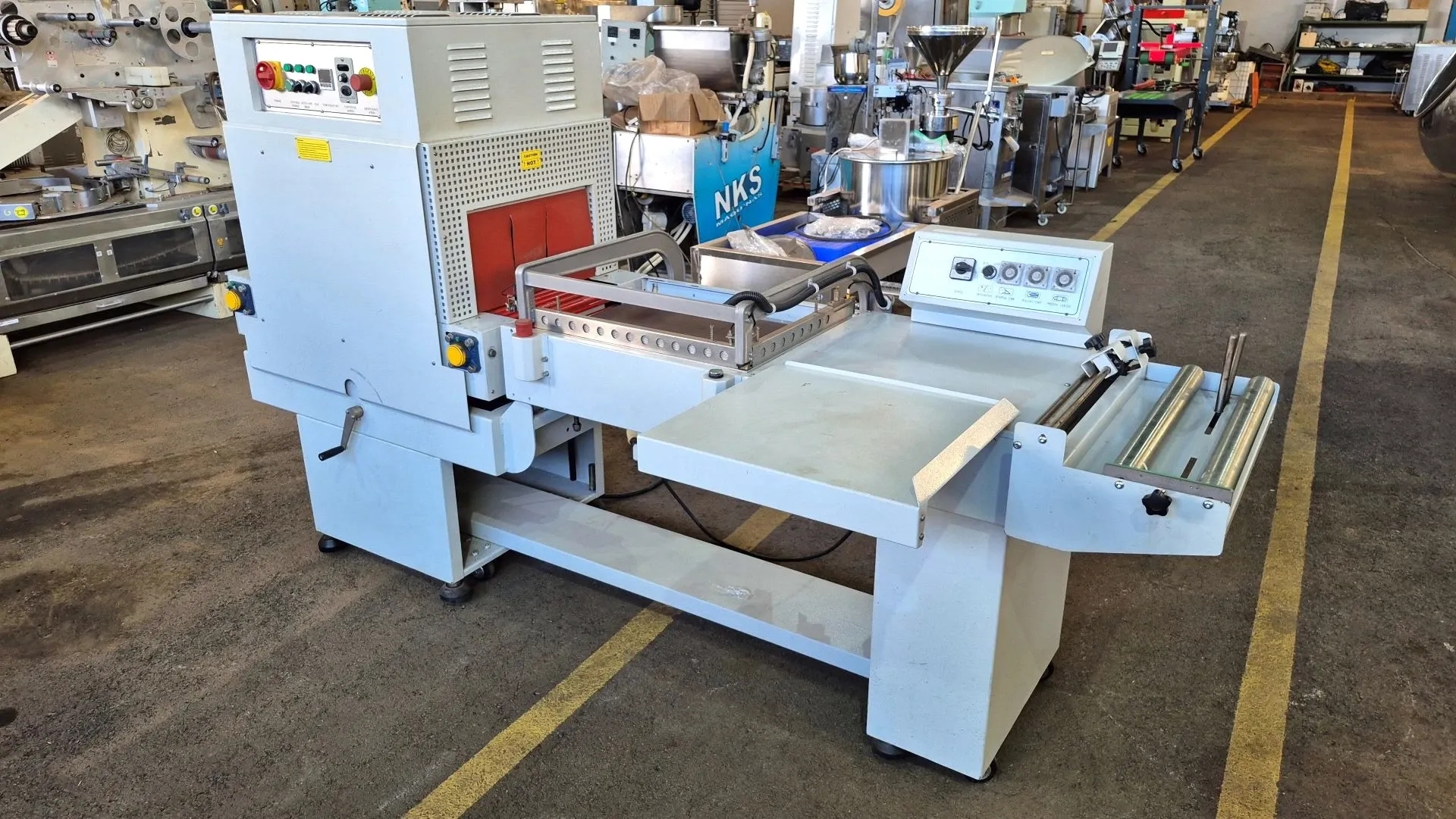 seladora-l-modelo-fl-5545-tb-com-tunel-de-encolhimento-modelo-sm-4525