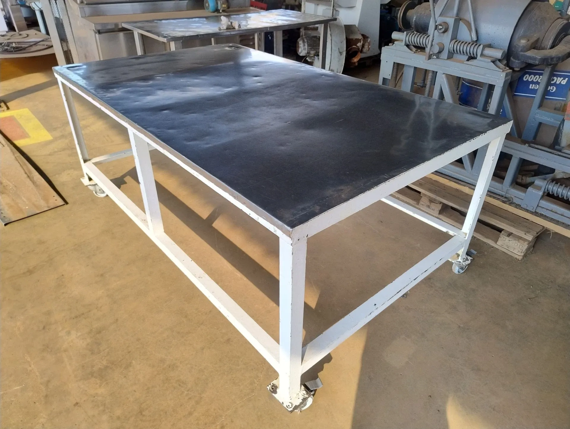 mesa-indust-aco-carbono-tampo-inox-dim-2-x-1.2-m-rodizios