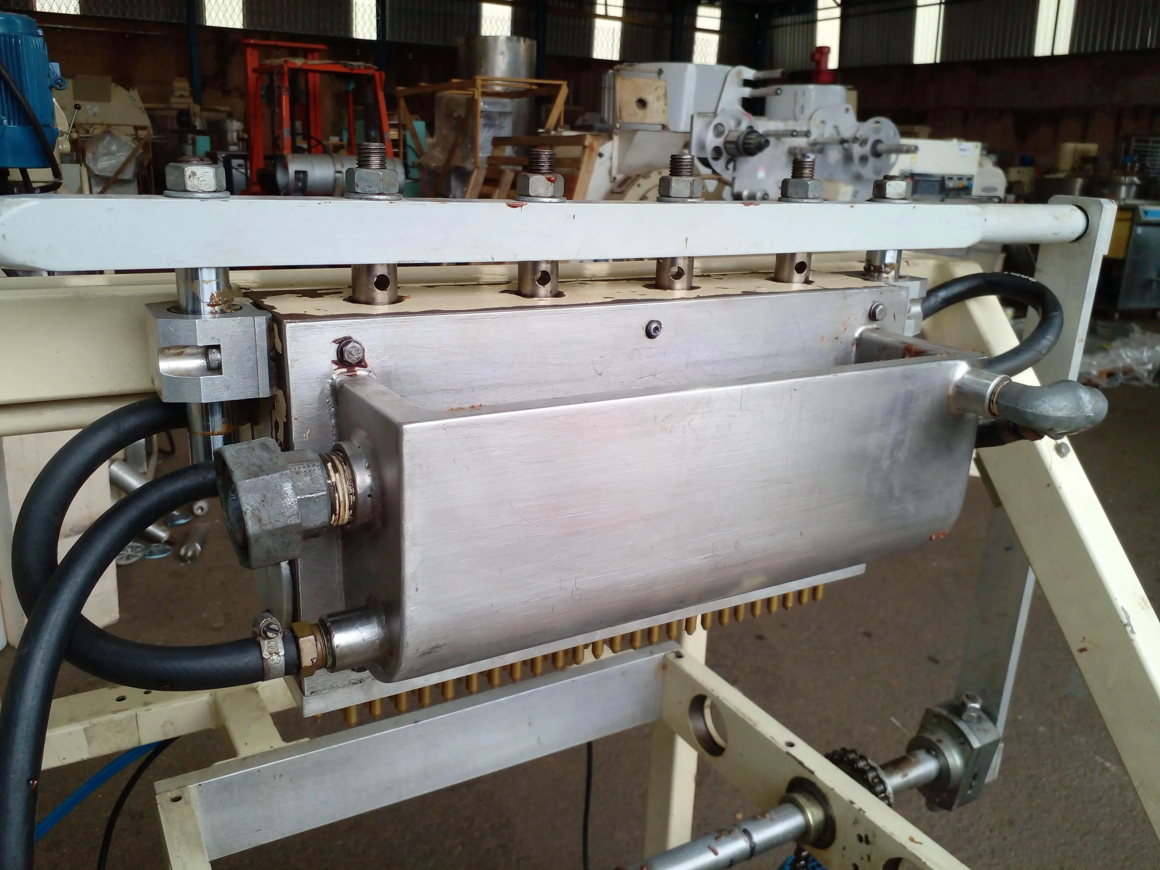 dosadora-de-gotas-de-chocolate-marca-limaq