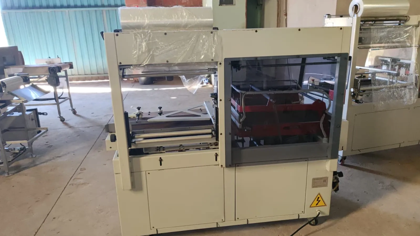 seladora-automatica-em-l-shrink-com-tunel-de-encolhimento-marca-bba-comex