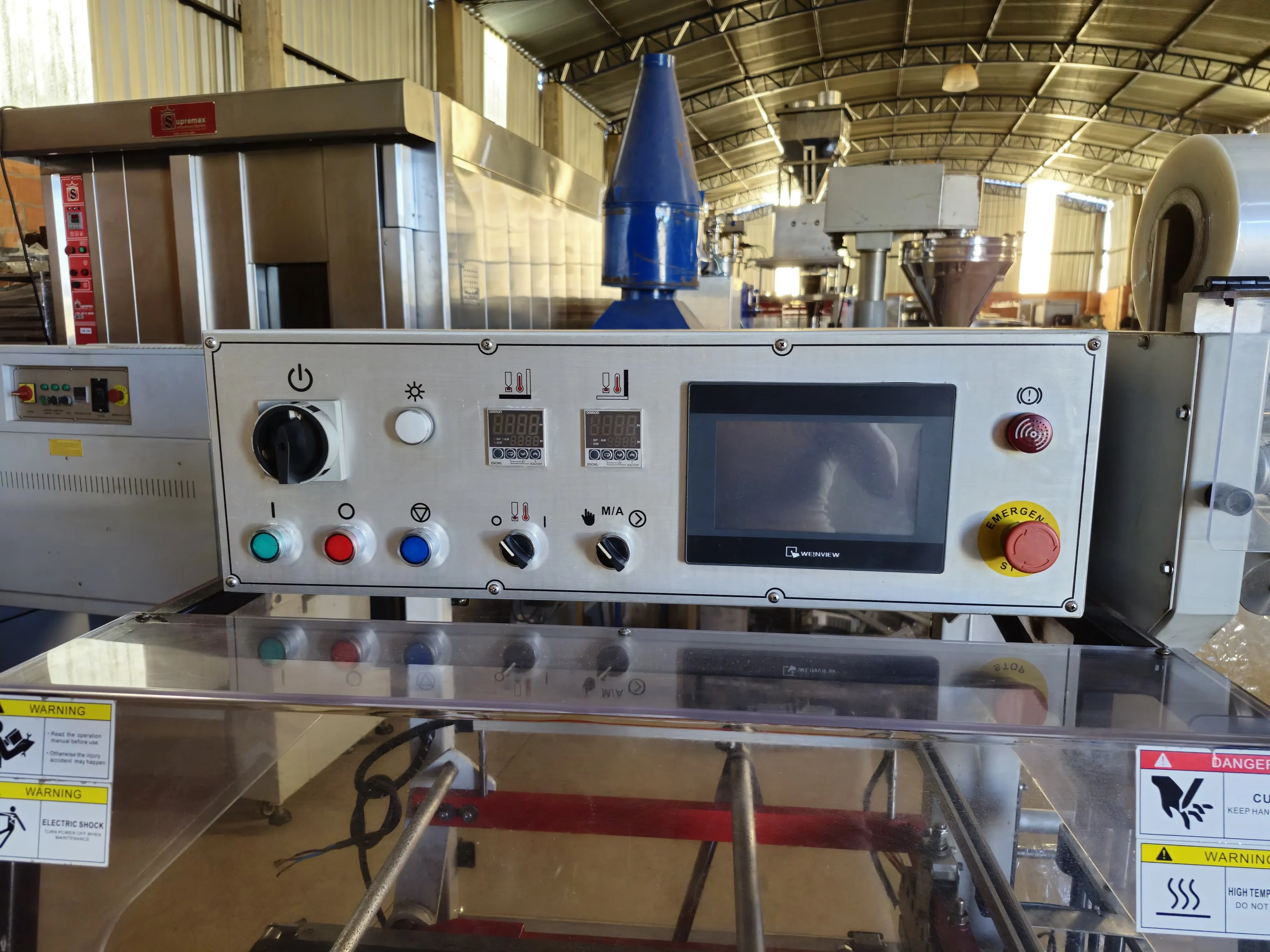 seladora-automatica-em-l-shrink-marca-tecfag