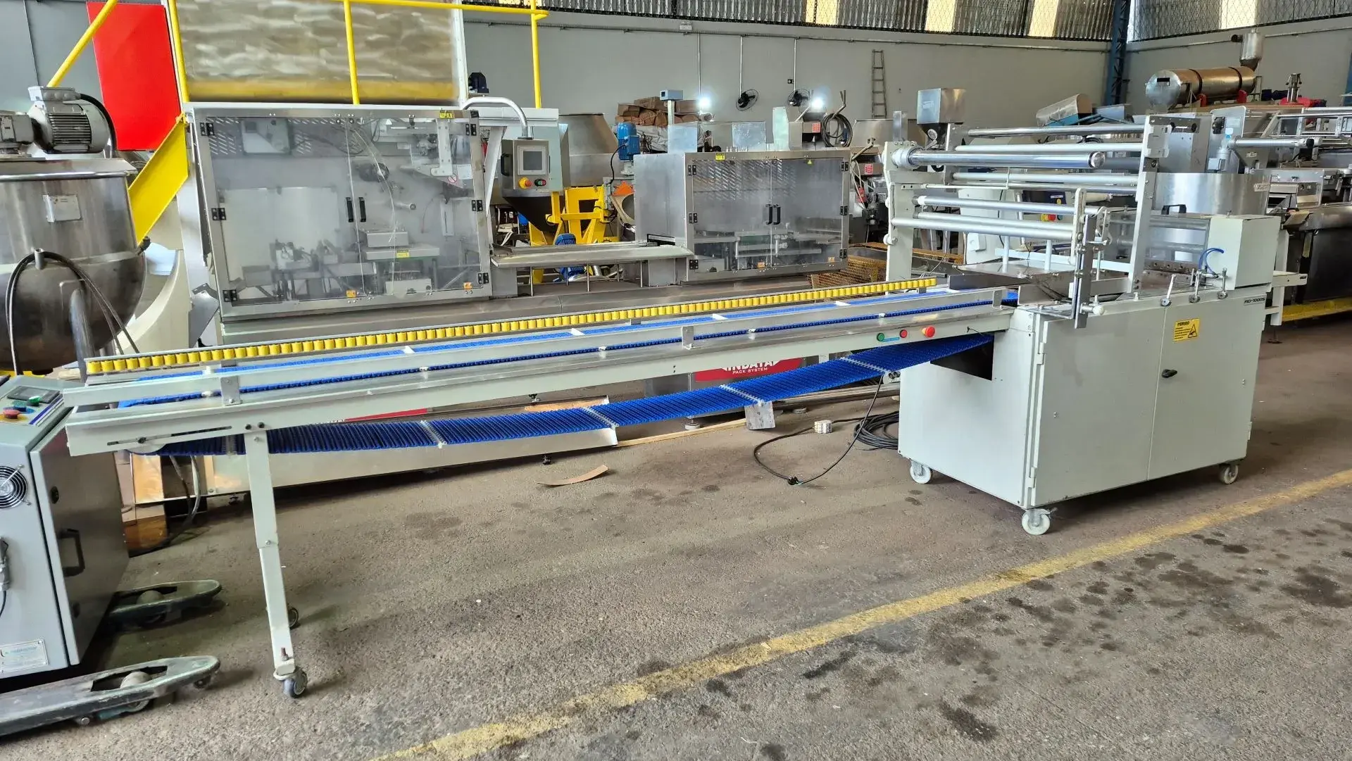 EMBALADORA FLOW PACK PARA PÃES DE HAMBÚRGUER E CACHORRO QUENTE MARCA RODOPACK