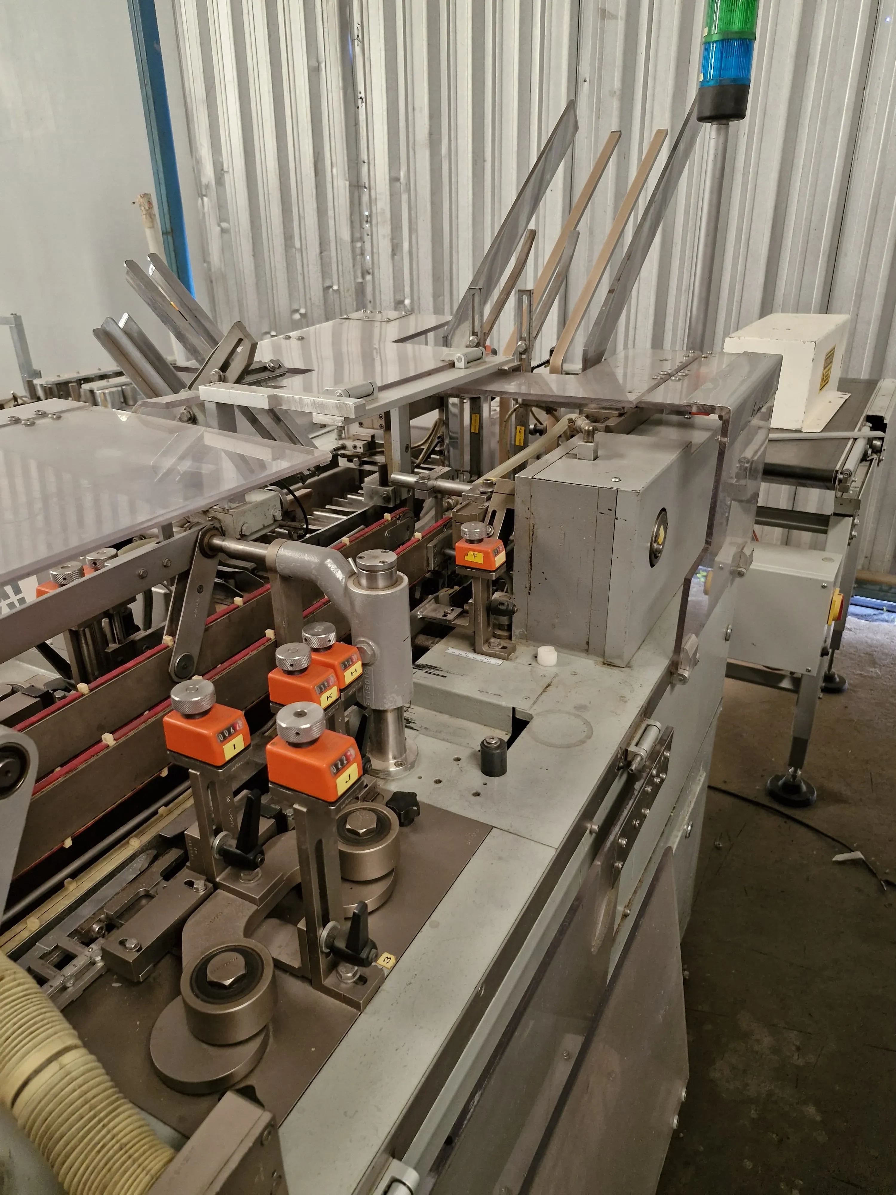 encartuchadeira-horizontal-automatica-para-frascos-plasticos-vidros-com-bula-marca-ima