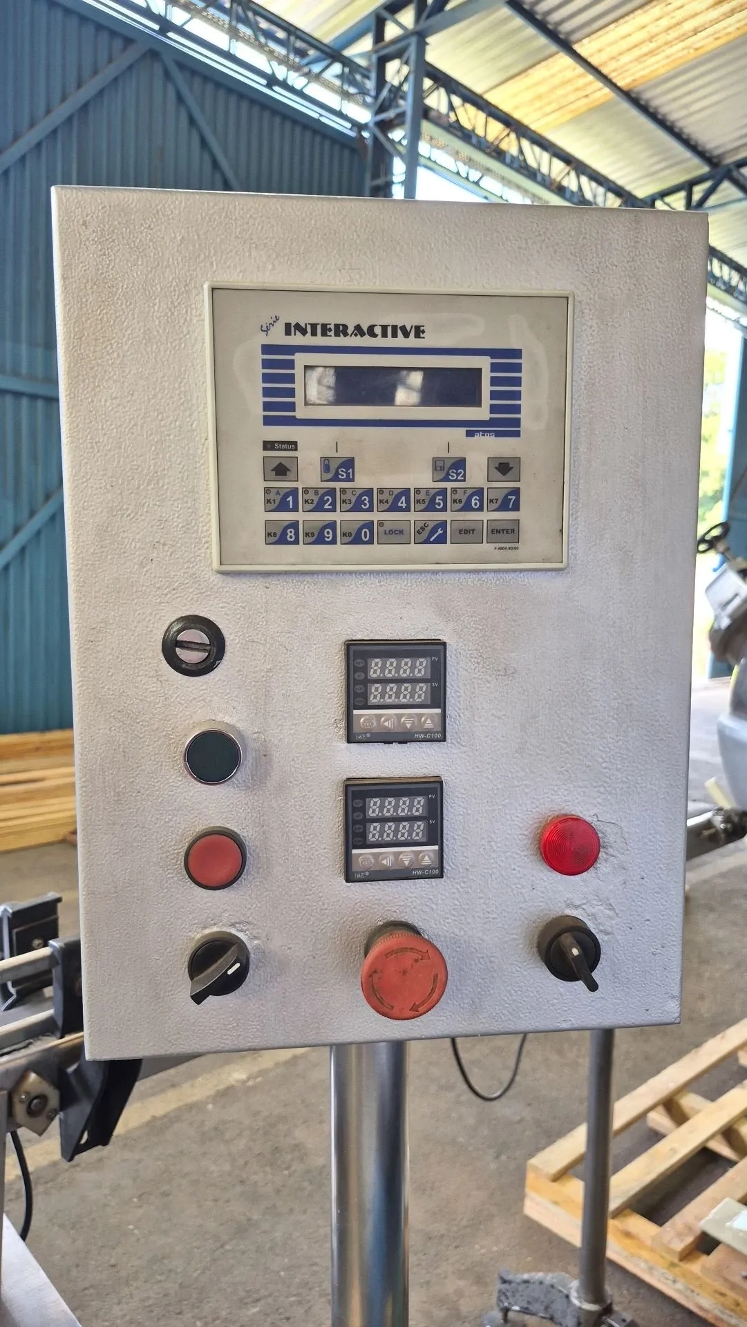 envasadora-dosadora-rotativa-de-liquidos-em-aco-inox-para-potes-e-copos
