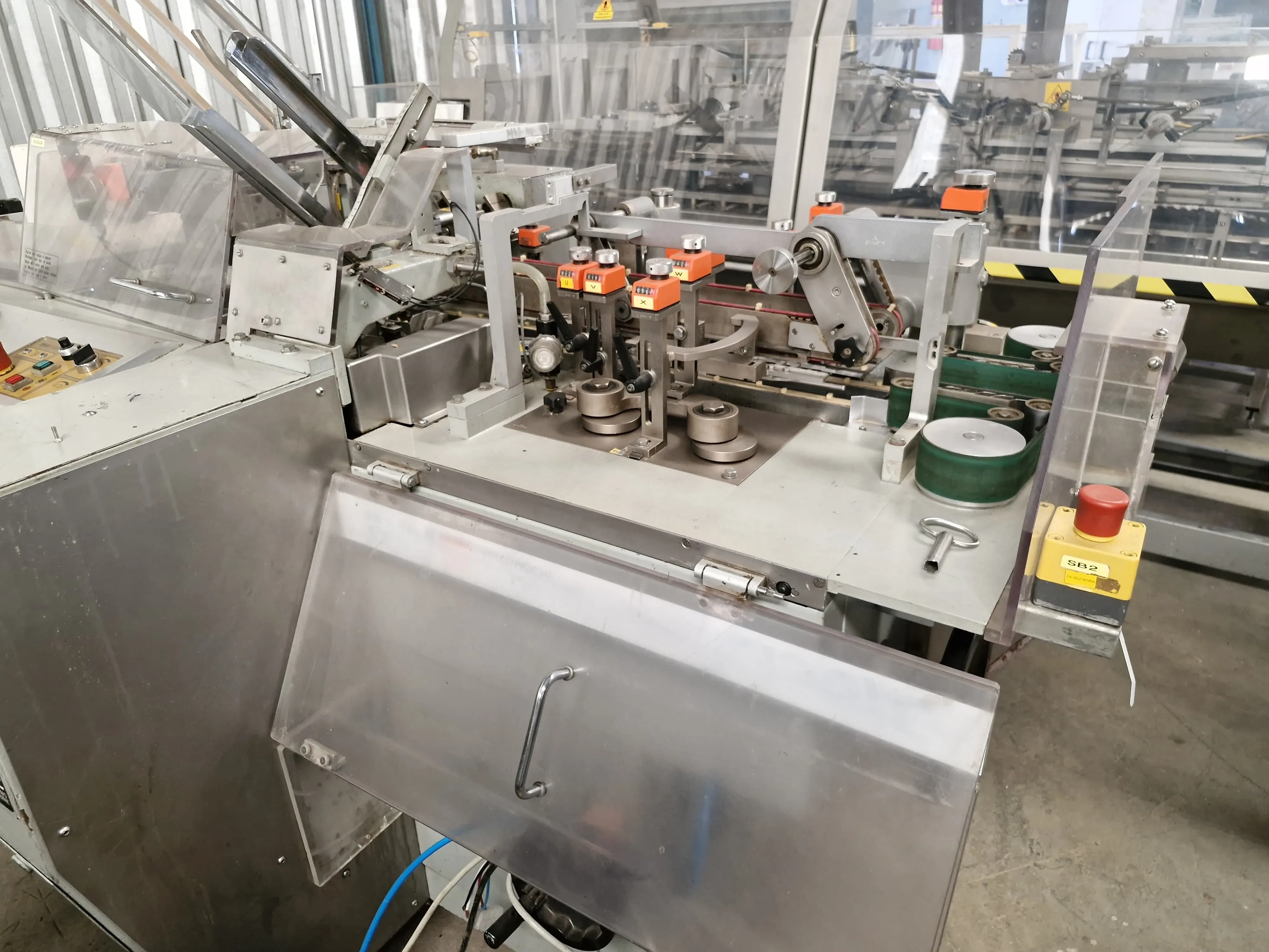 encartuchadeira-horizontal-automatica-para-frascos-plasticos-vidros-com-bula-marca-ima