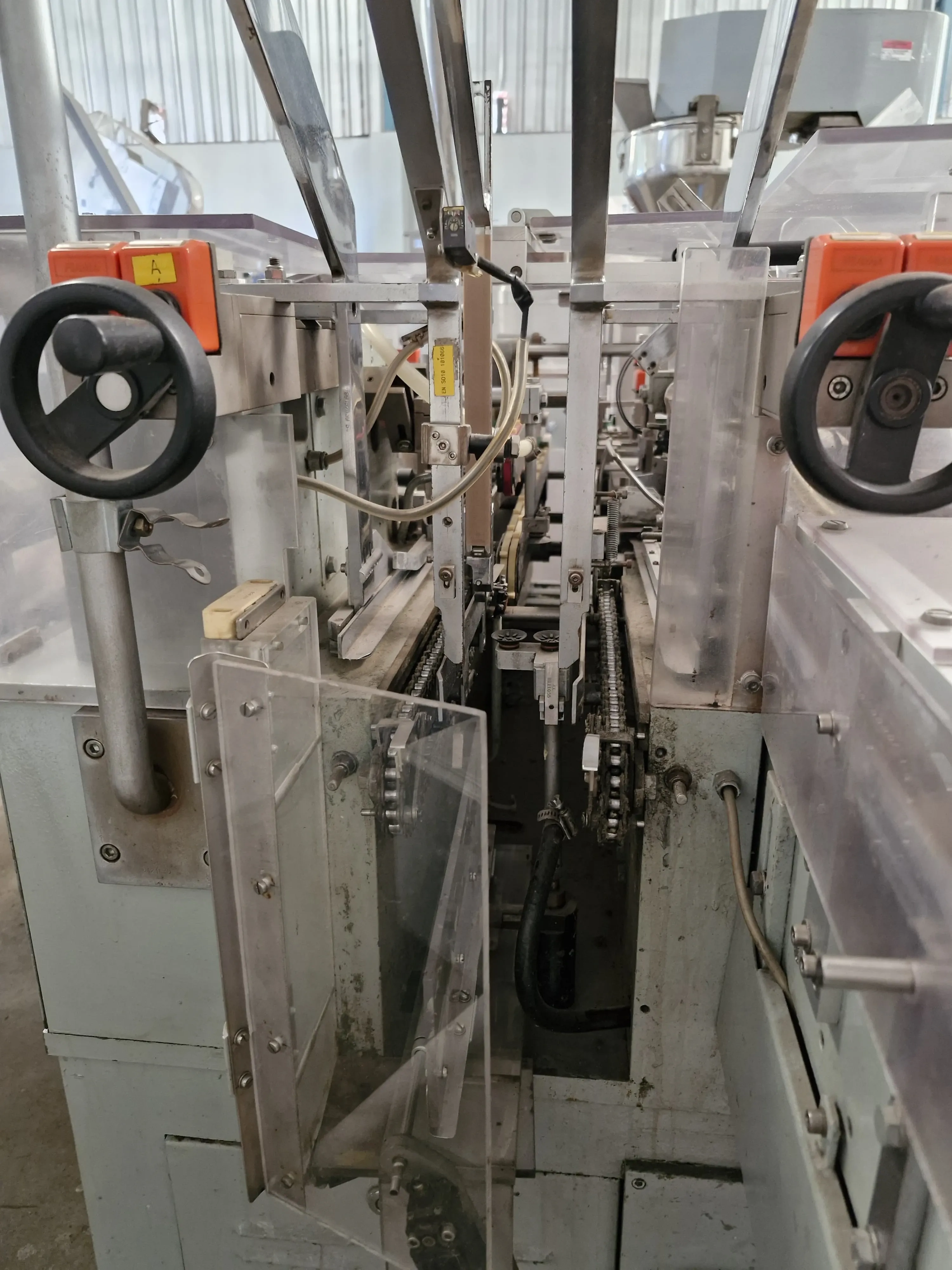 encartuchadeira-horizontal-automatica-para-frascos-plasticos-vidros-com-bula-marca-ima