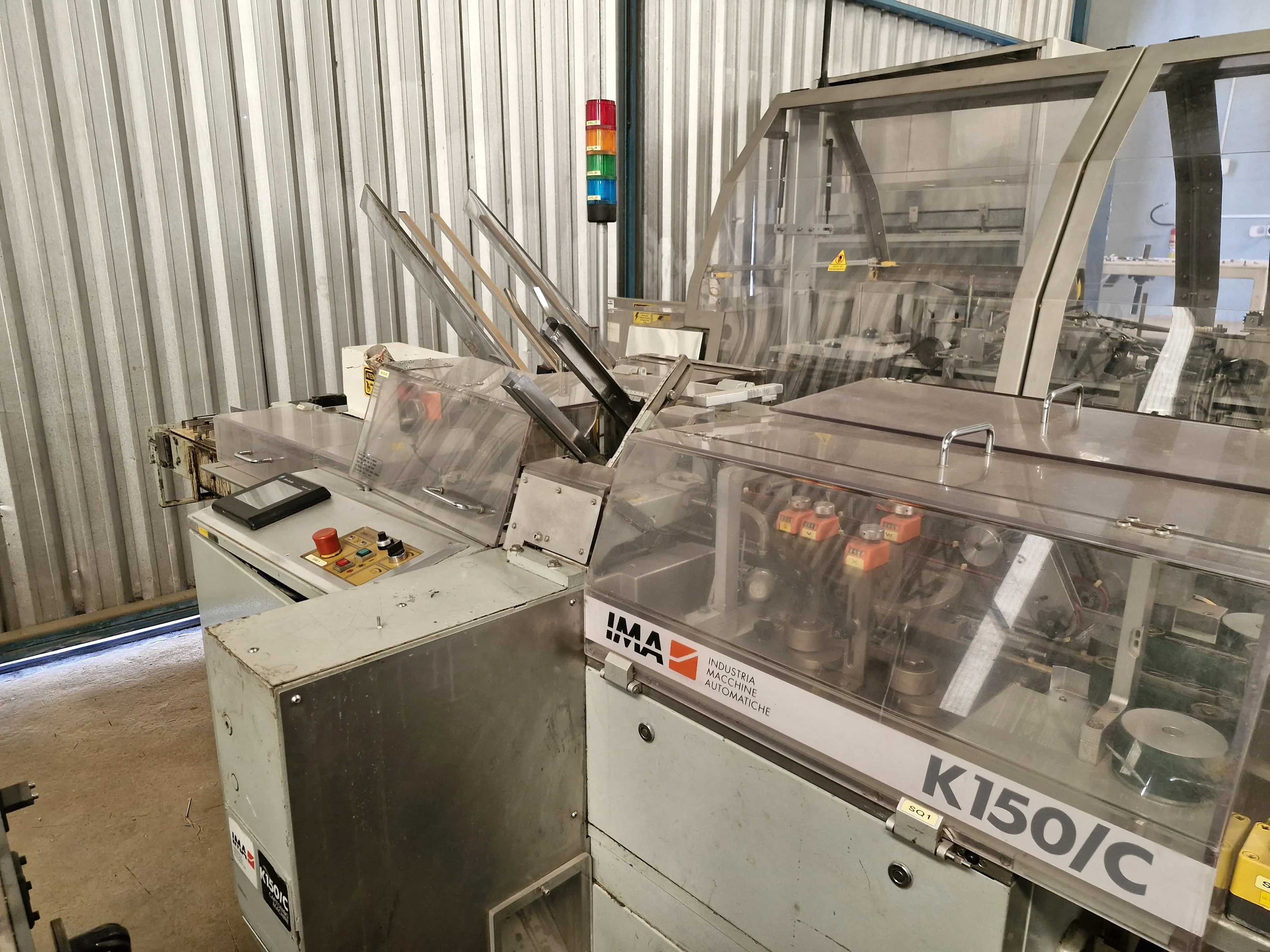 encartuchadeira-horizontal-automatica-para-frascos-plasticos-vidros-com-bula-marca-ima