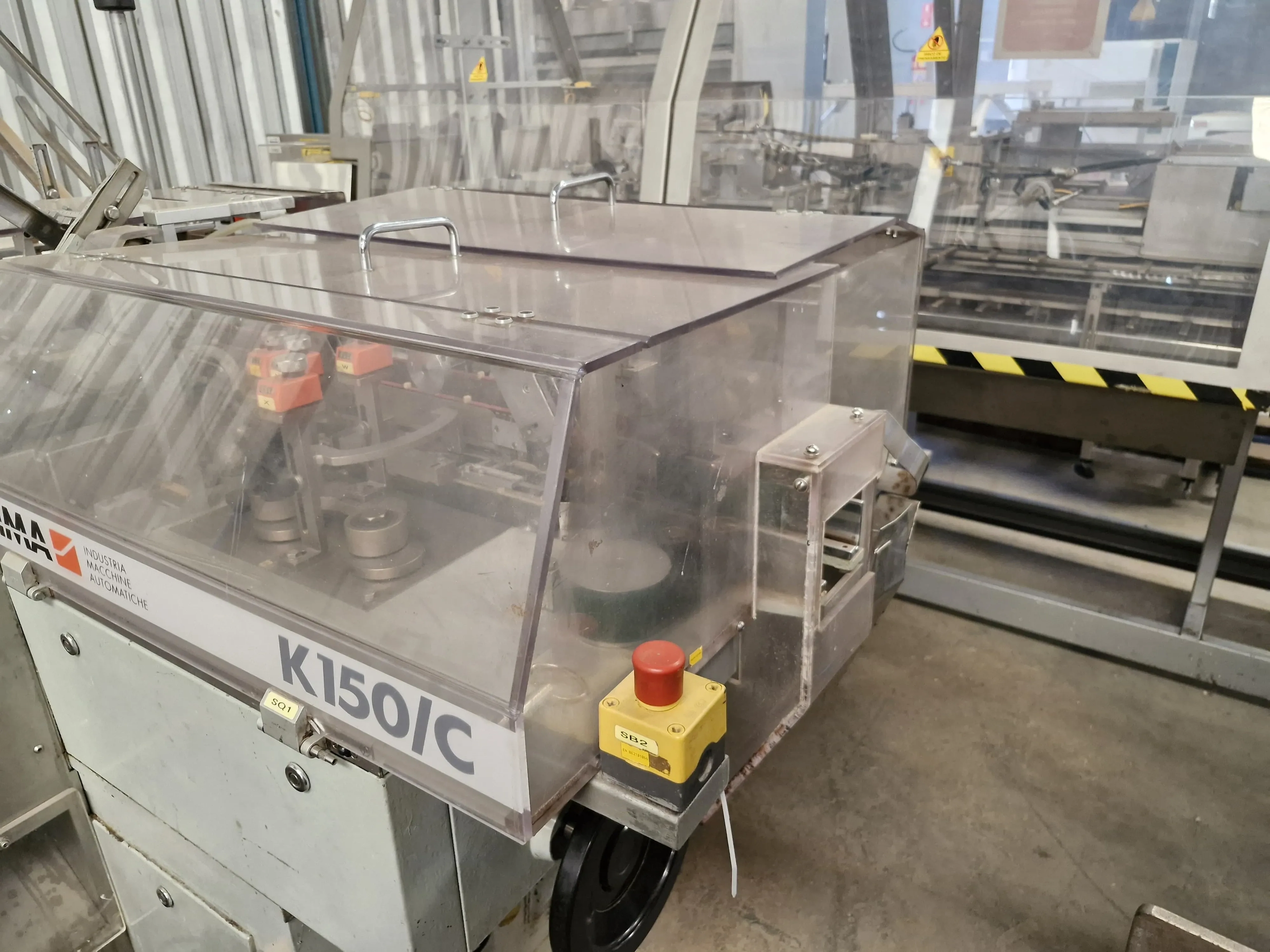 encartuchadeira-horizontal-automatica-para-frascos-plasticos-vidros-com-bula-marca-ima