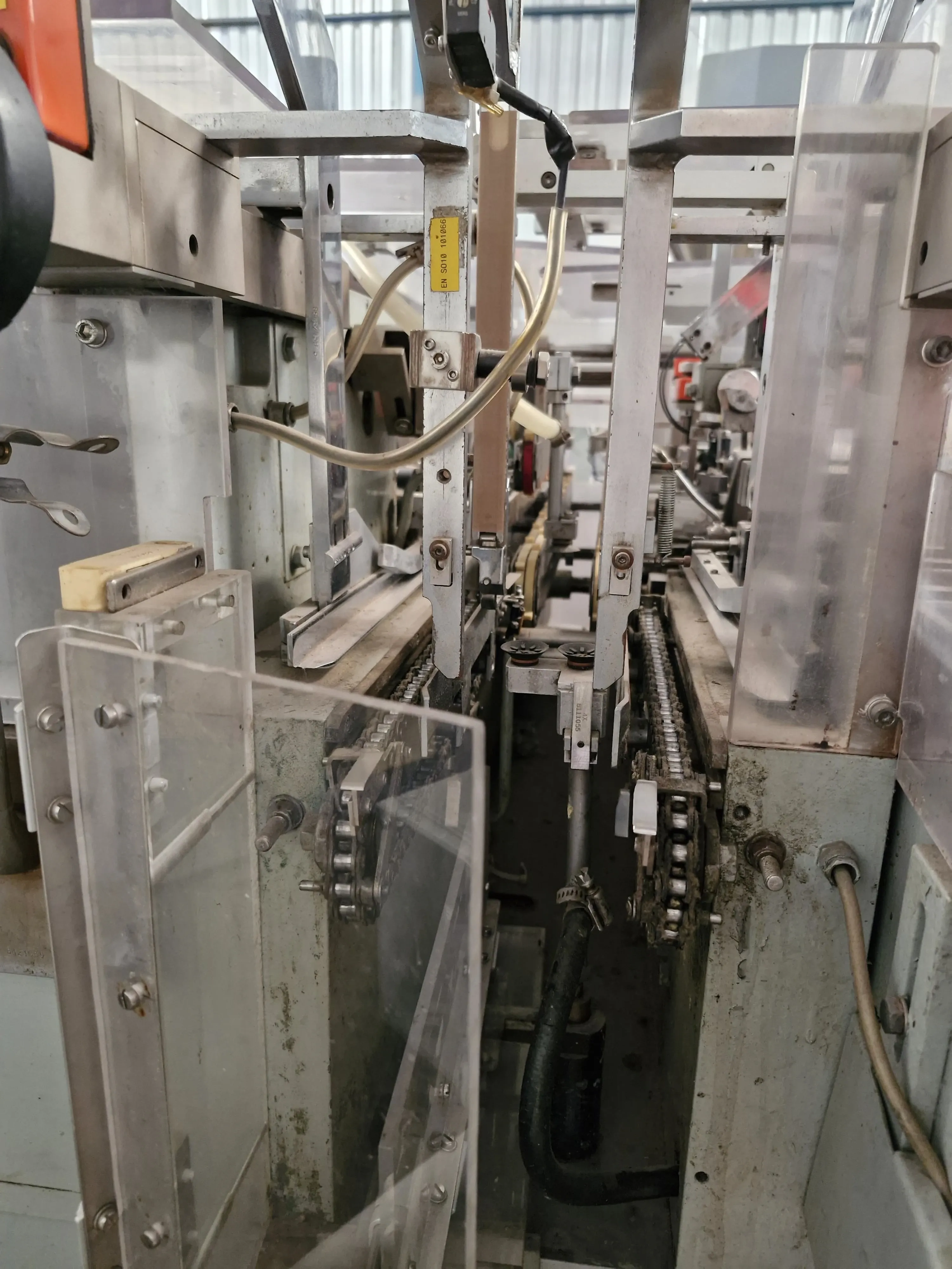 encartuchadeira-horizontal-automatica-para-frascos-plasticos-vidros-com-bula-marca-ima