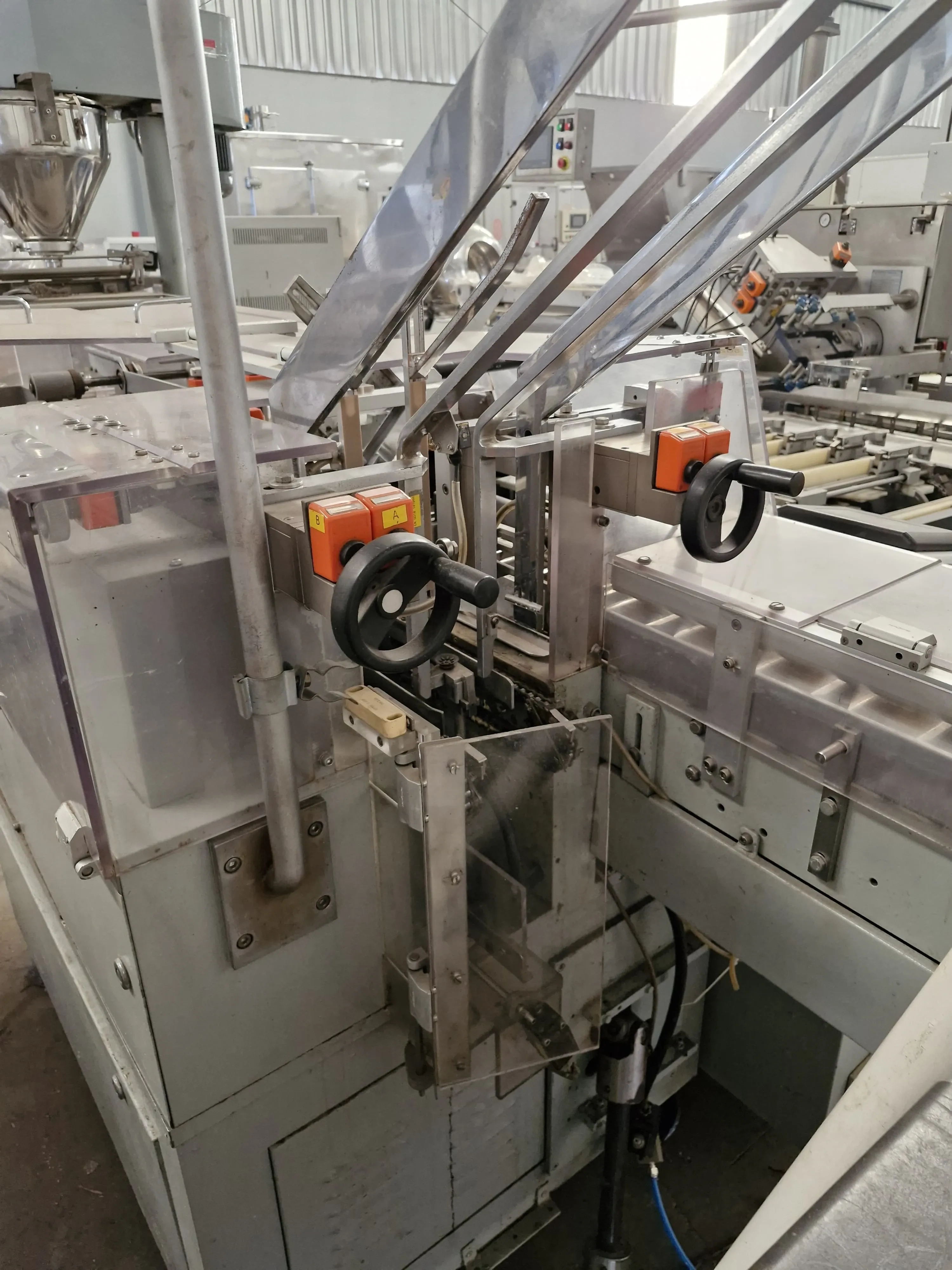 encartuchadeira-horizontal-automatica-para-frascos-plasticos-vidros-com-bula-marca-ima