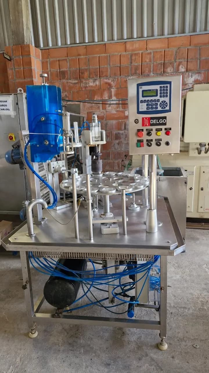 envasadora-dosadora-seladora-rotativa-automatica-em-aco-inox-para-selo-de-aluminio-para-copos-potes-e-frascos-delgo